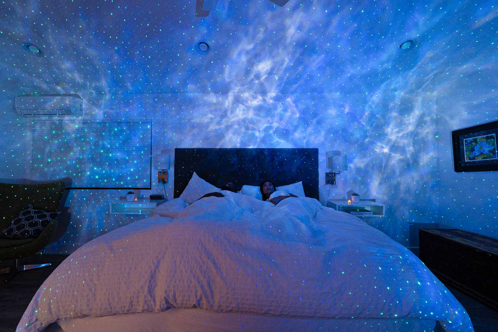 sky lite evolve galaxy projector in bedroom in blue