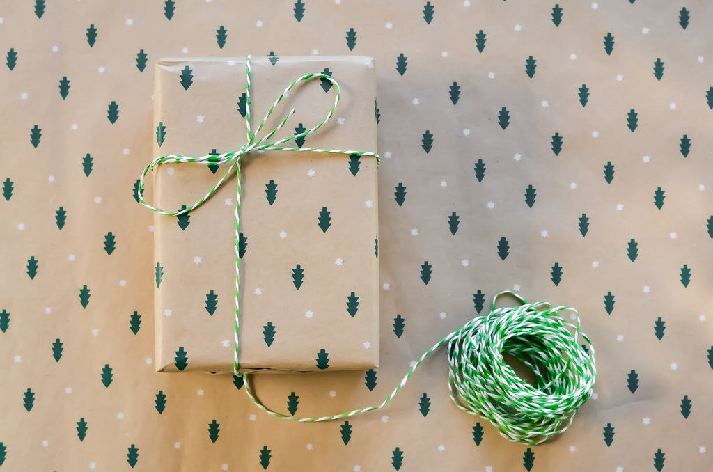 present with natural colored wrapping paper and bakers twine