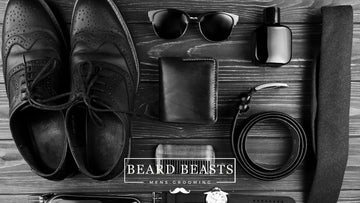 Items every mans should own, including dress shoes, wallet, sunglasses, belt, and cologne, with Beard Beasts Men's Grooming logo.