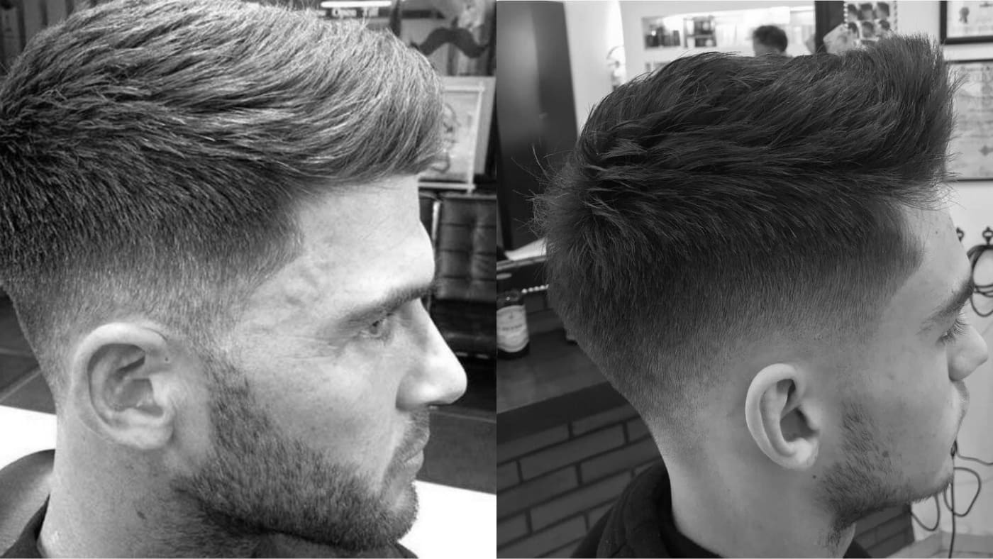 two men with low fades representing one part of the low fade vs mid fade debate