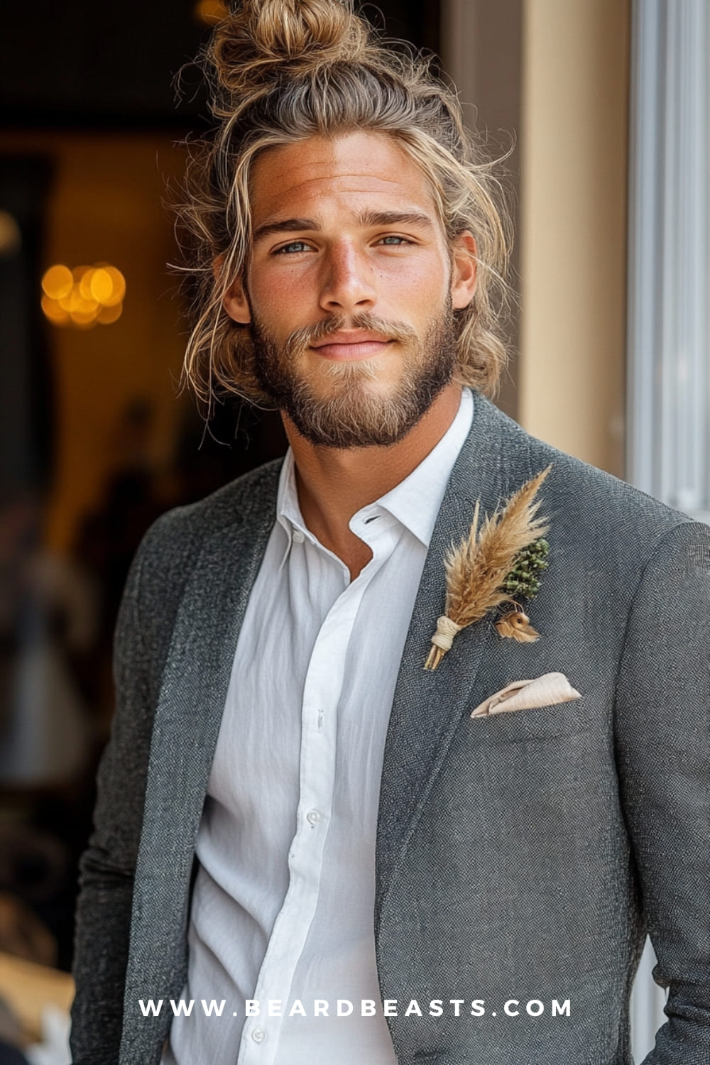 Stylish man bun for men with square faces, highlighting a strong jawline and adding a relaxed yet sophisticated touch, perfect for those with longer hair looking to enhance their facial structure.