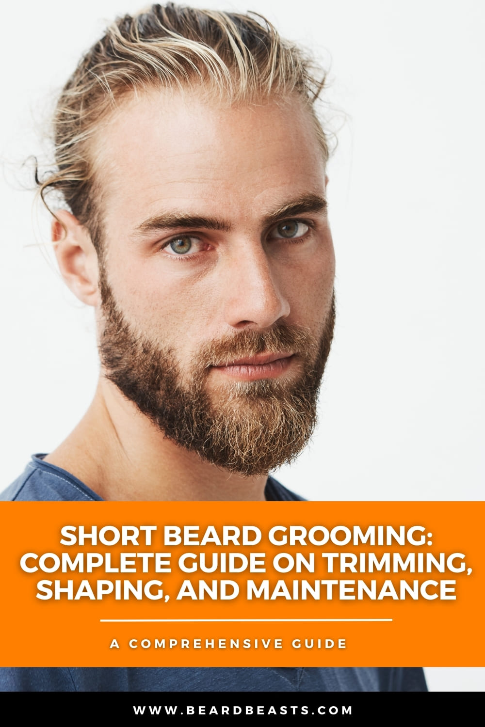 Promotional image of a man with a well-groomed short beard and tied-back man bun, featuring text "Short Beard Grooming: Complete Guide on Trimming, Shaping, and Maintenance" and "A Comprehensive Guide" at the bottom, along with the website URL www.beardbeasts.com. This image is used to illustrate a comprehensive guide on short beard grooming, including tips on trimming, shaping, and maintaining a short beard for a polished look.