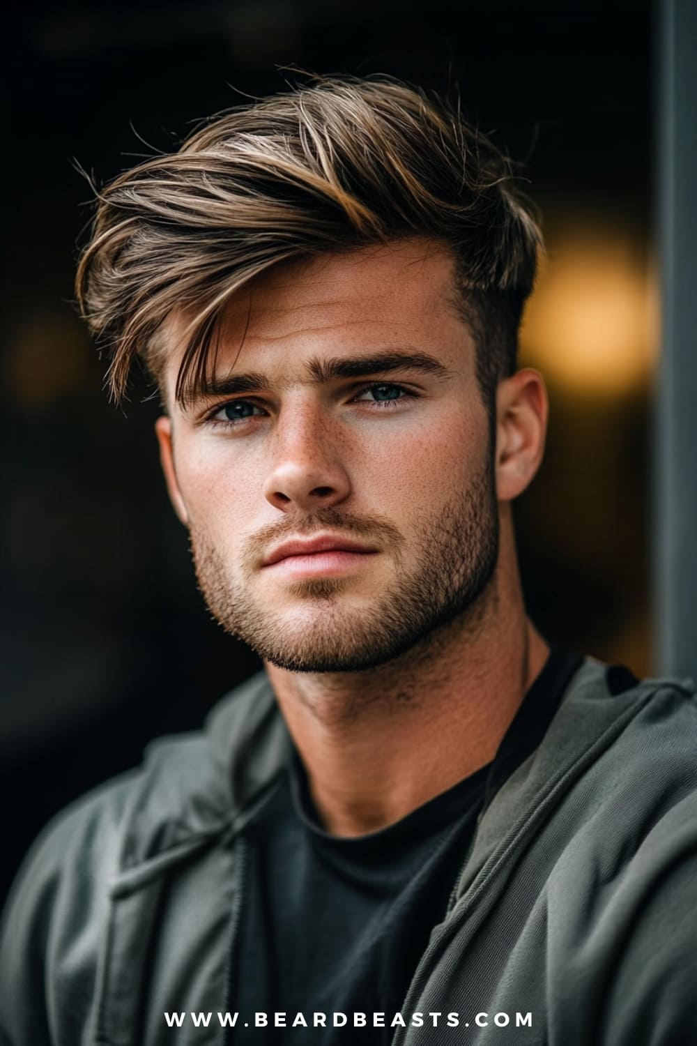 A man with stylish side-swept bangs is featured in this image, showcasing his thin straight hair neatly swept to one side for a voluminous and modern look. The longer top layers add texture and depth, creating the illusion of fuller hair, while the shorter sides keep the style sharp and defined. This hairstyle for men with thin straight hair enhances the natural texture and adds movement, perfect for those looking to achieve a casual yet polished appearance. Paired with a subtle beard and a relaxed outfit, this hairstyle exudes confidence and effortless style.