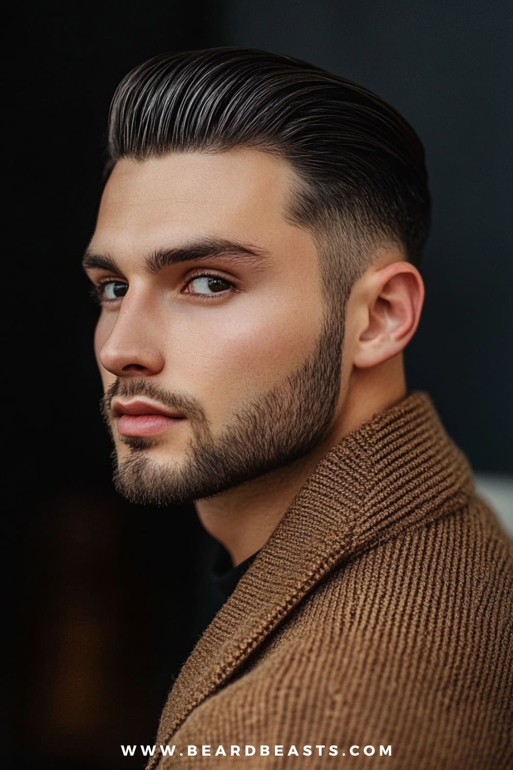 A man with a sharp slicked-back hairstyle is featured in this profile shot, showcasing sleek and polished hair styled neatly away from the face. The medium-length hair on top is smoothly combed back, giving the appearance of fullness, while the sides are trimmed shorter for a clean contrast. This medium-length hairstyle for men with thin hair is ideal for creating a sophisticated and voluminous look, making the hair appear thicker. Paired with a well-groomed beard and a textured jacket, this style exudes confidence and refinement, perfect for both casual and formal occasions.