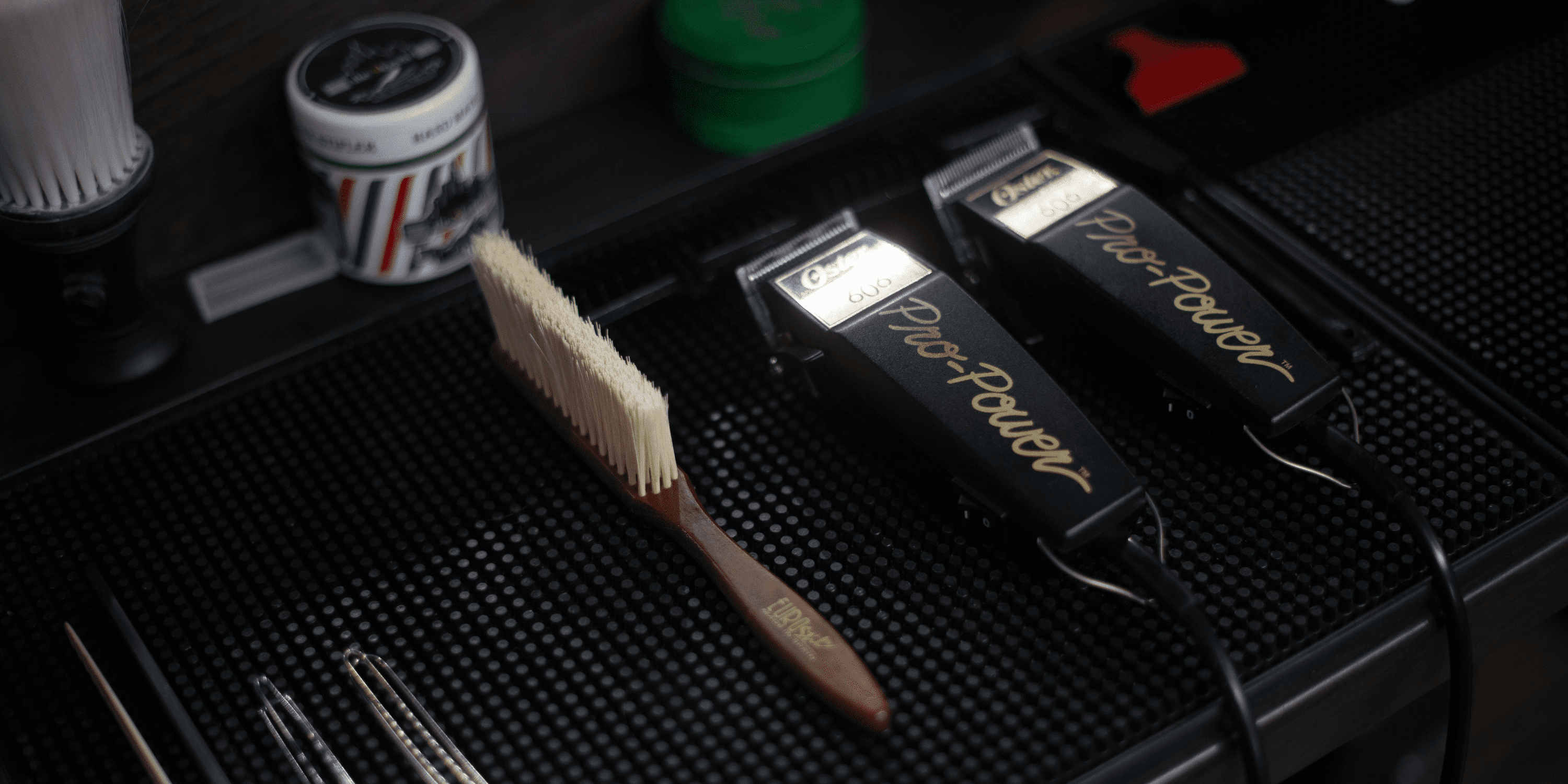 a photo of a pair of hair clippers on a barbershop table